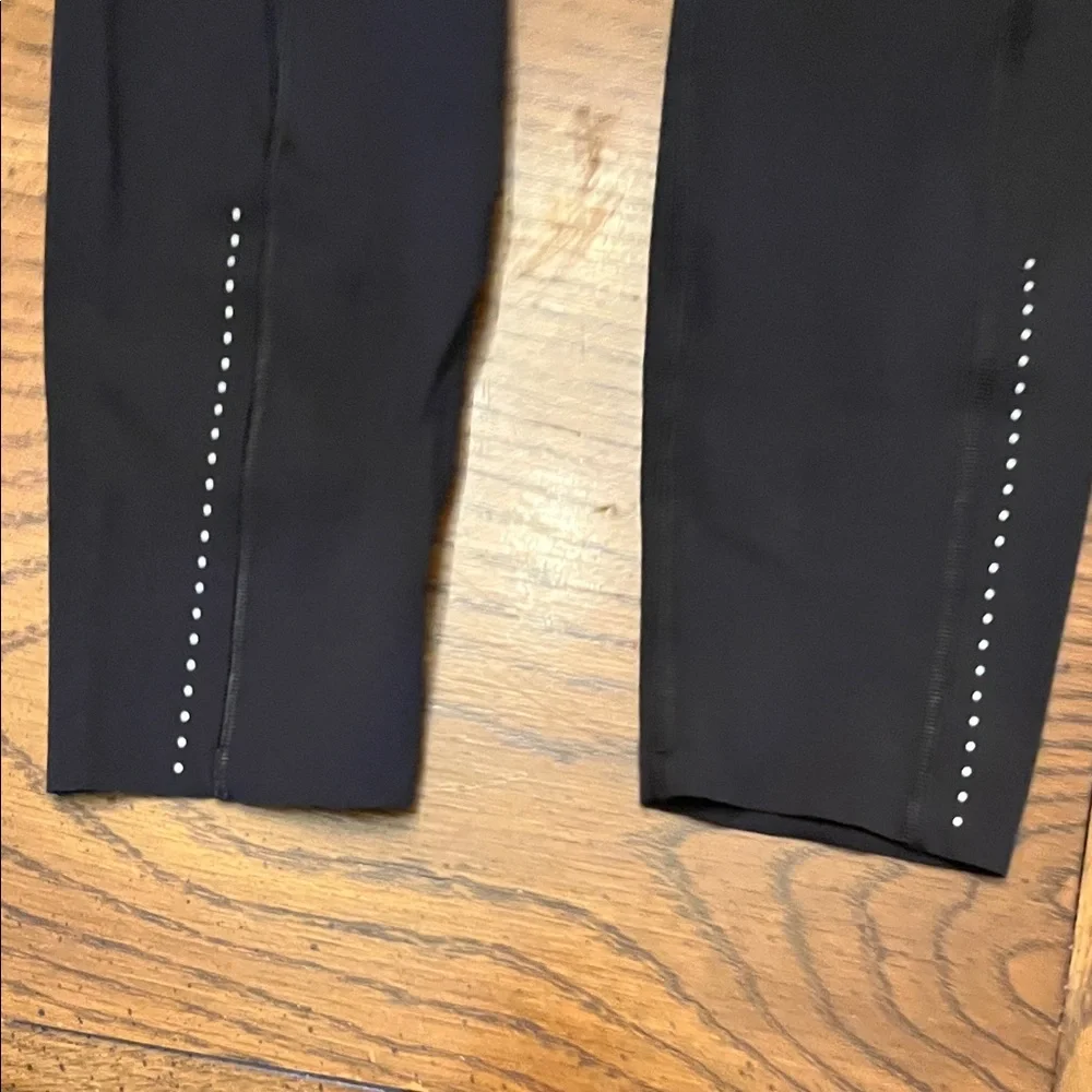Lululemon Black High-Waisted 7/8 Leggings with‎ Reflective Detail, size 4